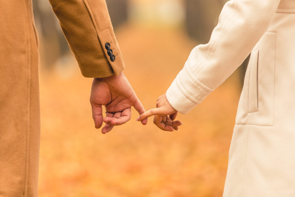A loving couple holding each others hands