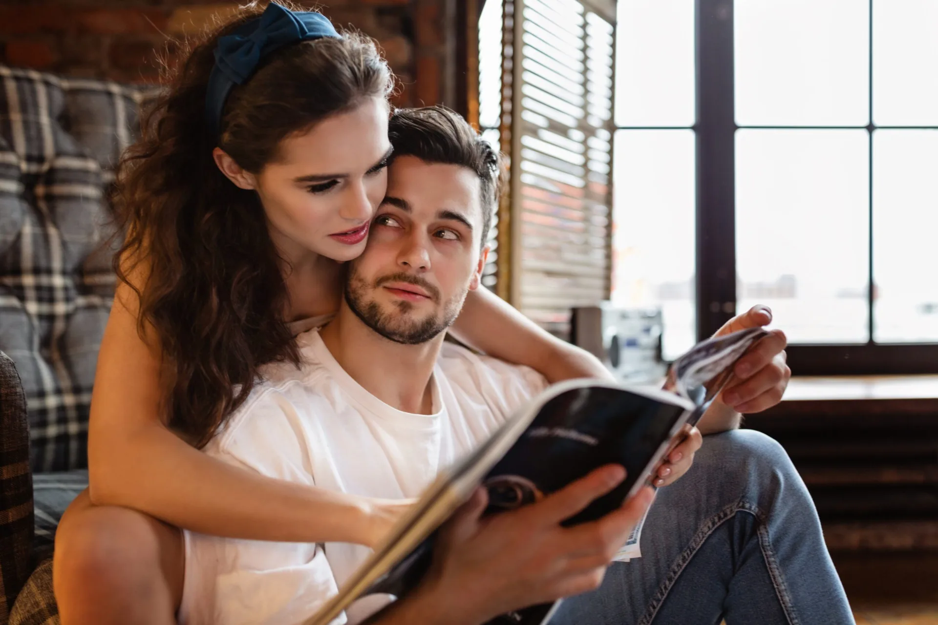 millennial-couple-in-love-relaxing-at-home-together
